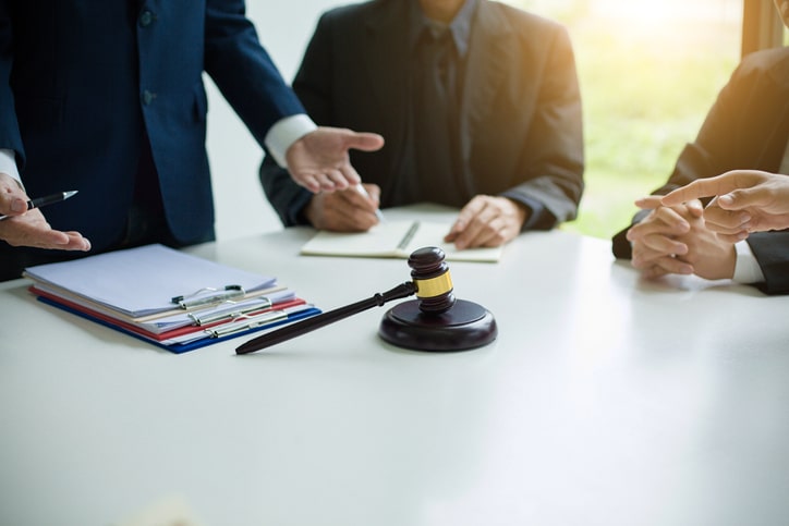 lawyers discussing a clients bankruptcy case.