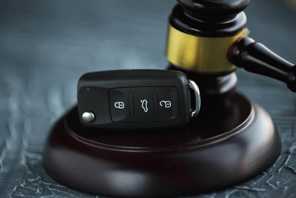 car keys on top of a gavel