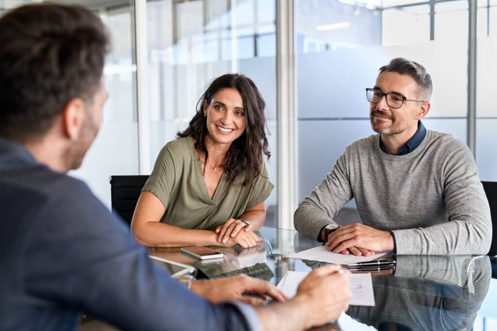 Couple speaking with a bankruptcy lawyer