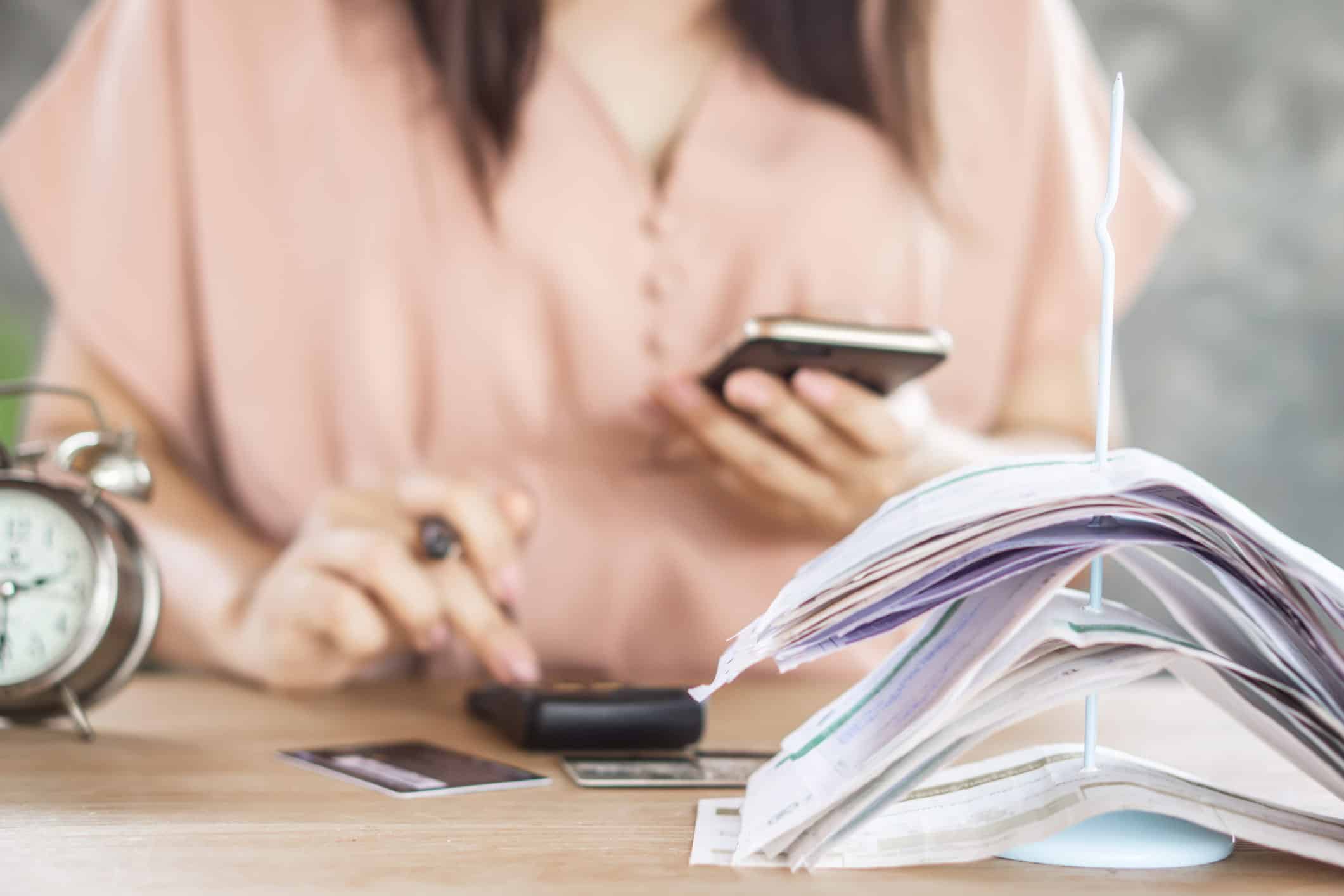 woman on the phone with a debt collector