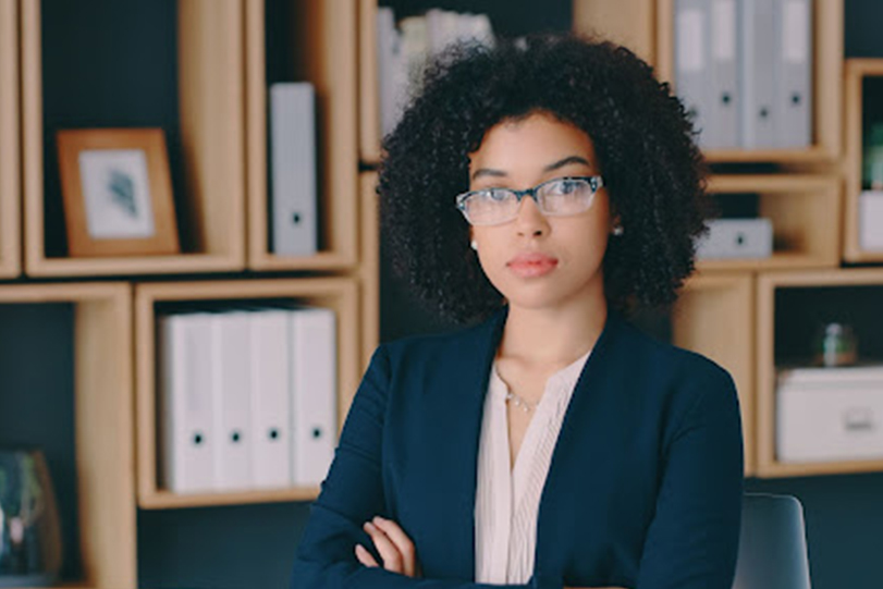 lady bankruptcy lawyer standing with her arms crossed