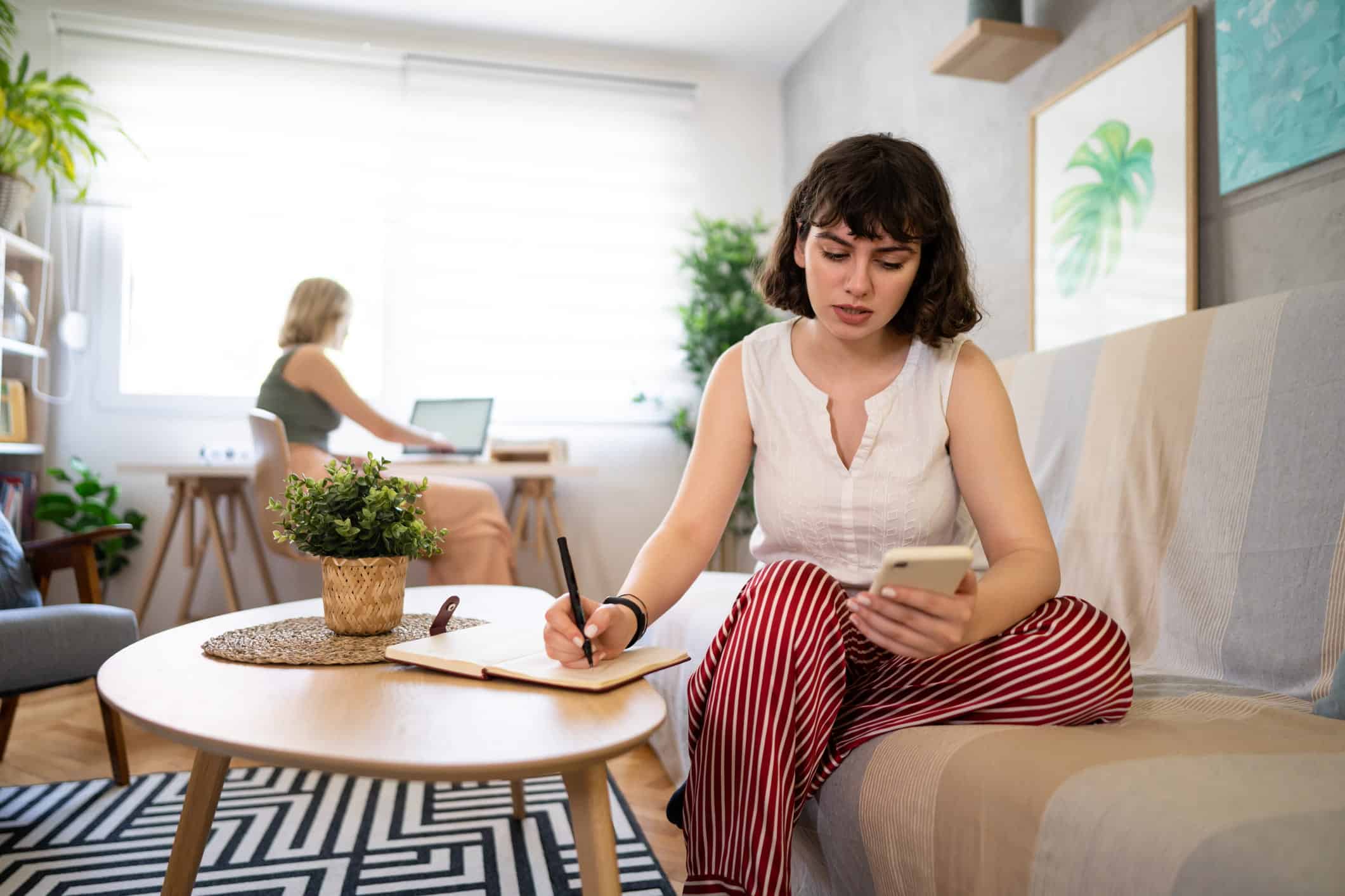 woman calculating student loan expenses