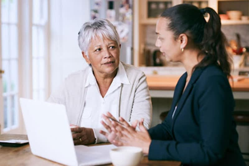 woman speaking with tax professional