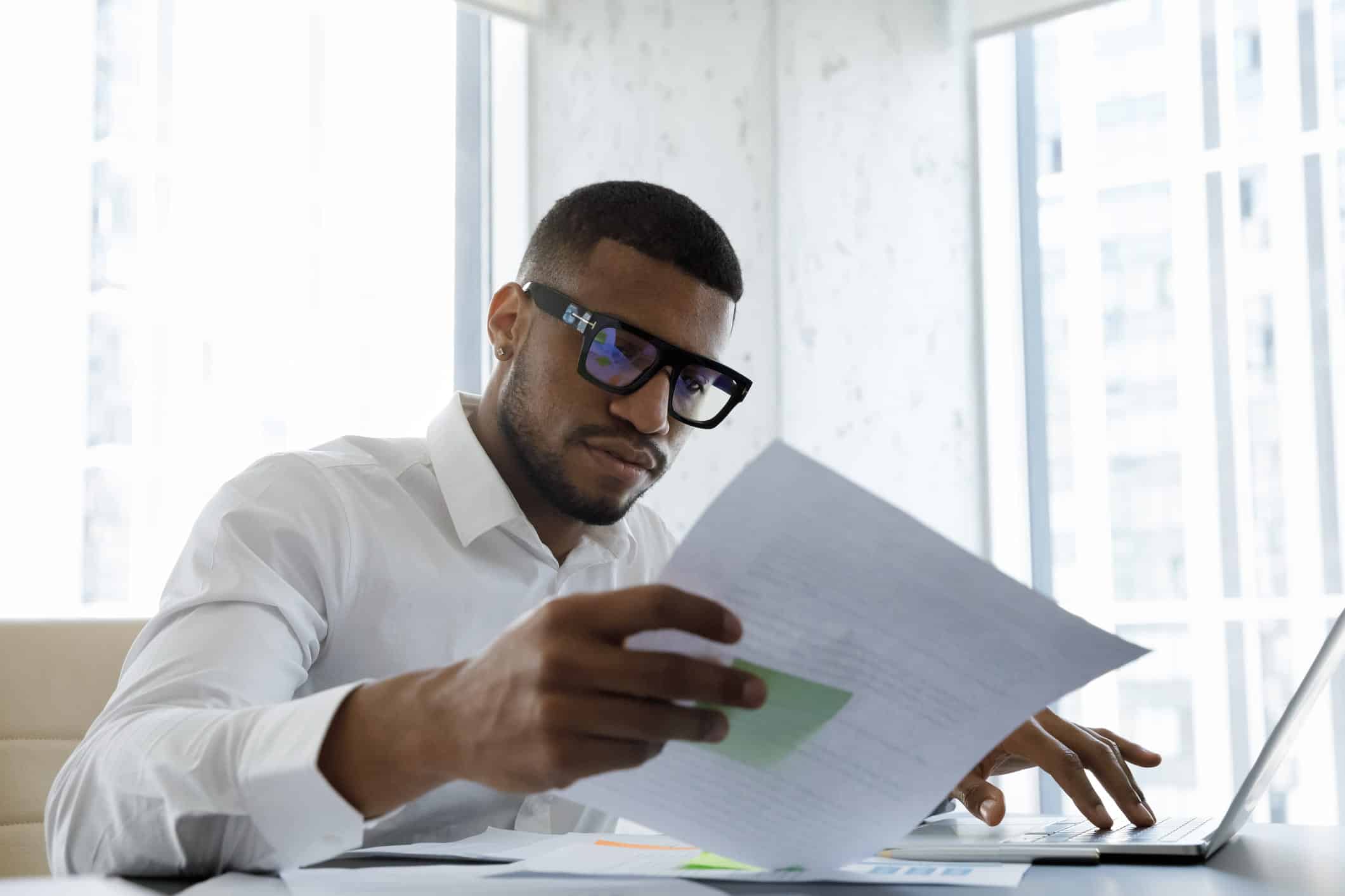 man reviewing bankruptcy documents