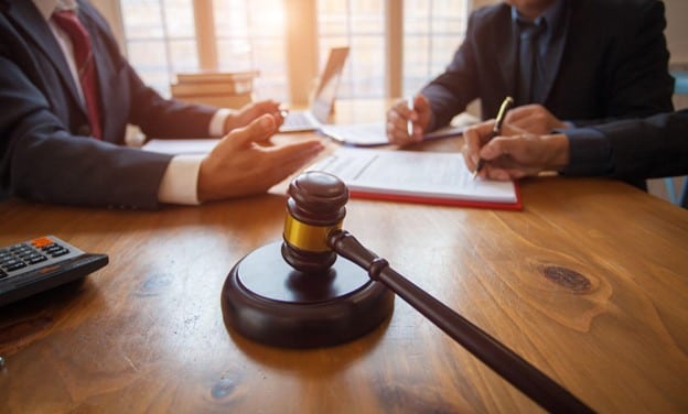 bankruptcy attorneys talking around a table