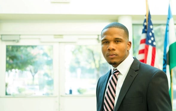 bankruptcy attorner standing in front of the american flag